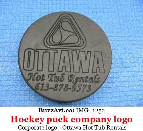 Company Ottawa Hot Tub Rentals engraved on hockey puck